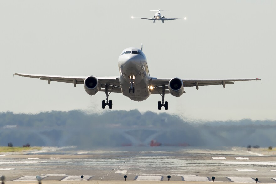 An American Airlines Airbus A319 airplane takes off from Ronald Reagan Washington National Airport in Arlington, Va.