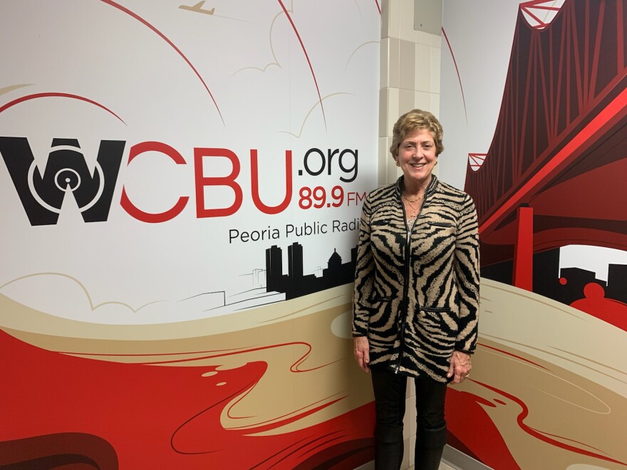 Sara Connor-James poses for a photo in the WCBU newsroom.