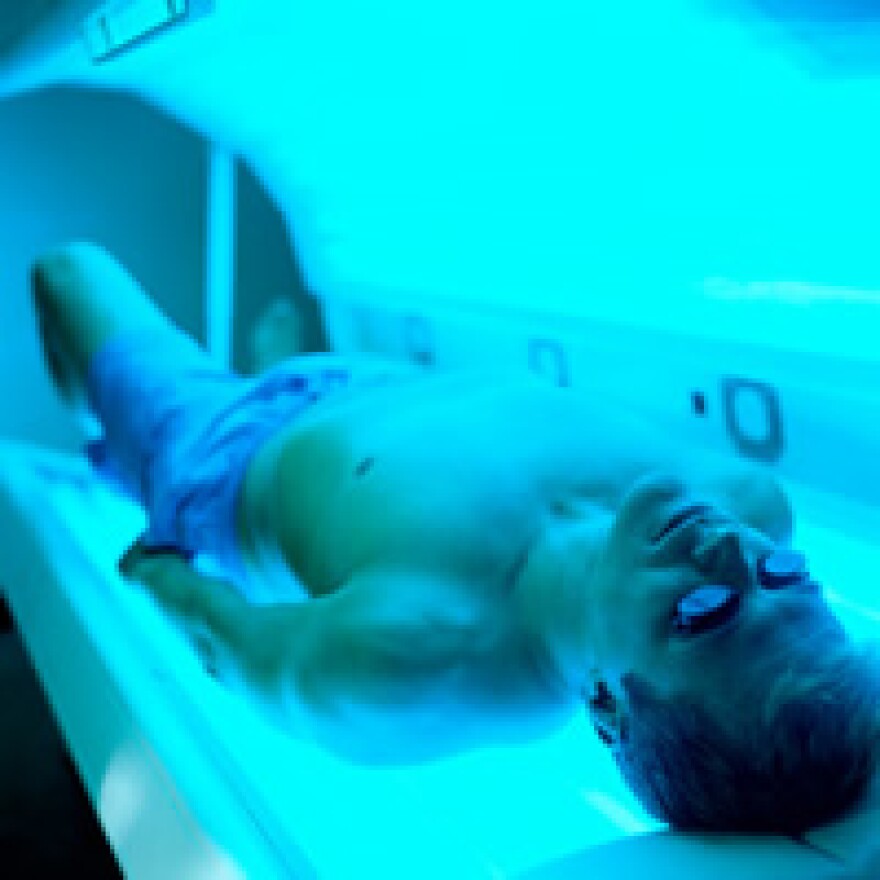 man in a tanning bed