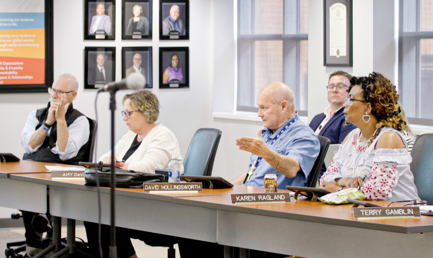 David Hollingsworth (second from right) is one of two EVSC District 2 trustees up for re-election this year. Hollingsworth said his work on the board enhances hos work on the PTA.