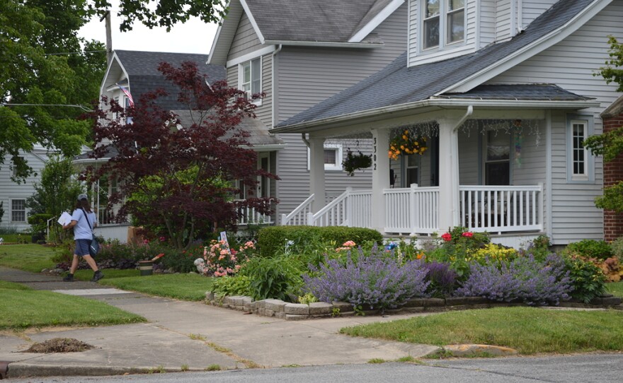 An Indiana Avenue tour garden and neighborhood streetscape