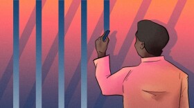 A person in a pink shirt, possibly a detainee unfit for trial at Menard County Jail, holds a blue marker and draws vertical lines on a gradient background transitioning from orange to blue. The scene is viewed from behind the person.