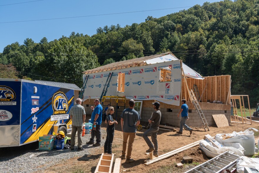 Students from Kent State's construction management program work to rebuild a home destroyed by Hurricane Helene in Johnson County on Friday, September 12, 2025. The Ohio-based students are just some of the thousands of volunteers who have surged into the region in Helene's aftermath to provide resources and labor to those who lost everything.