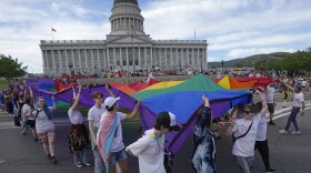 People march following a Pride rally at the Utah State Capitol Friday, June 2, 2023, in Salt Lake City.