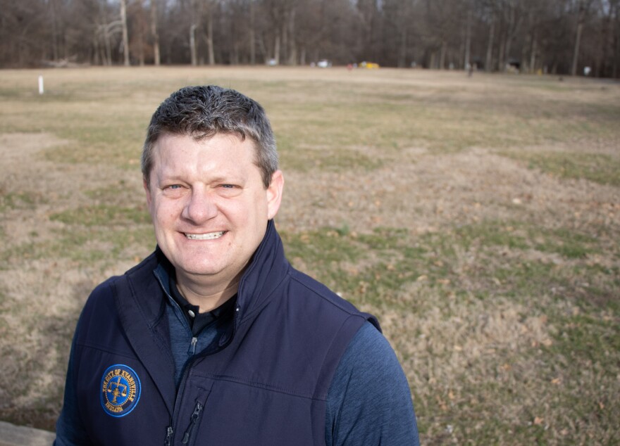 Evansville Deputy Mayor and Interim Parks Director Steve Schaefer stands before the open field that will be converted to pickleball courts.