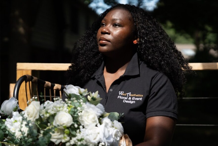 Weedberline Cetoute poses for a portrait at her home on July 18, 2026 in Indianapolis. Cetoute speaks about the impact of the immigration changes and the effects on her family.