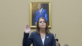 Woman raises right hand in court 