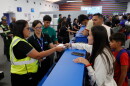 Passengers check in at Simon Bolivar International Airport as it reopens to commercial flights two months after closing due to the earthquake in Maiquetia, Venezuela, Tuesday, Sept. 1, 2026.