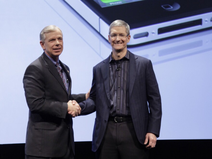 Lowell McAdam (left), Verizon's president, and Tim Cook, chief operating officer of Apple, announce that Verizon Wireless will carry Apple's iPhone 4. Verizon's iPhone has a new feature — a mobile hot spot.