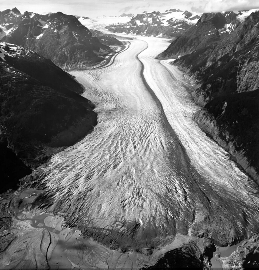 The vast Tulsequah Glacier descends from the Juneau Icefield, topping the Coast Mountains on the border of Alaska and British Columbia in August 1961.