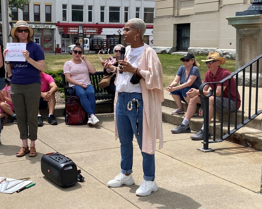 Woman speaking at abortion rights protest