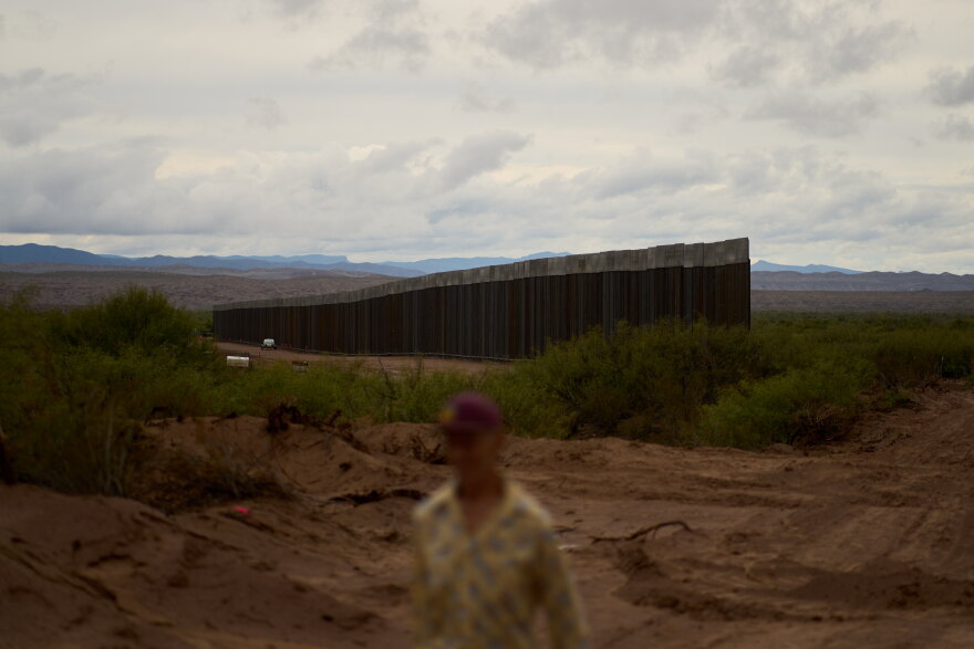 Bill Addington visits a border wall under construction near his property Wednesday, Sept. 23, 2026, near Sierra Blanca, Texas.