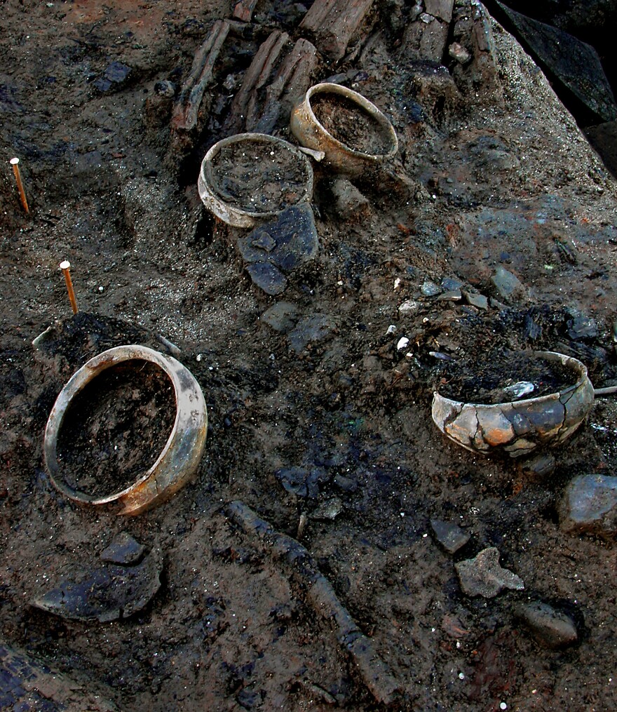 Whole pots were preserved inside timber dwellings destroyed by fire. Archaeologists discovered there was still food in some of them.