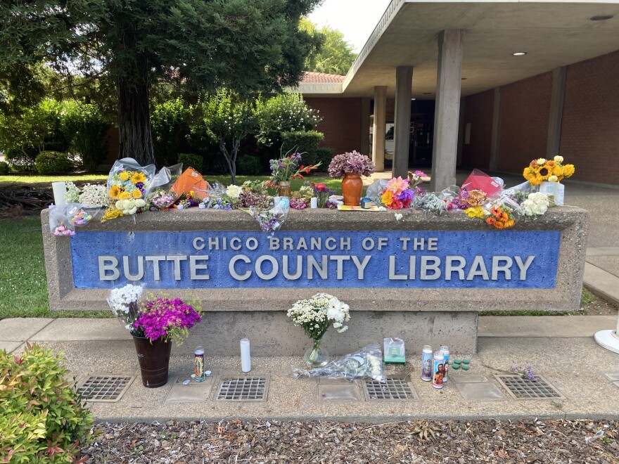 Flowers are left outside the Butte County Library in Chico, Calif. on June 25, 2026.
