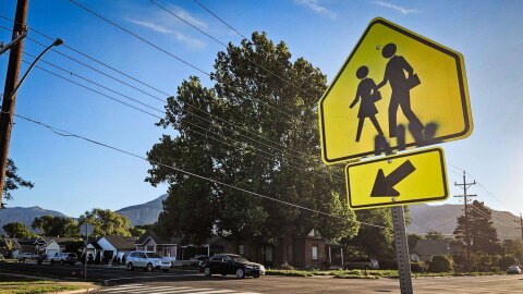 A zebra crosswalk with a school crossing sign near a school in Ogden, Sept. 10, 2026.