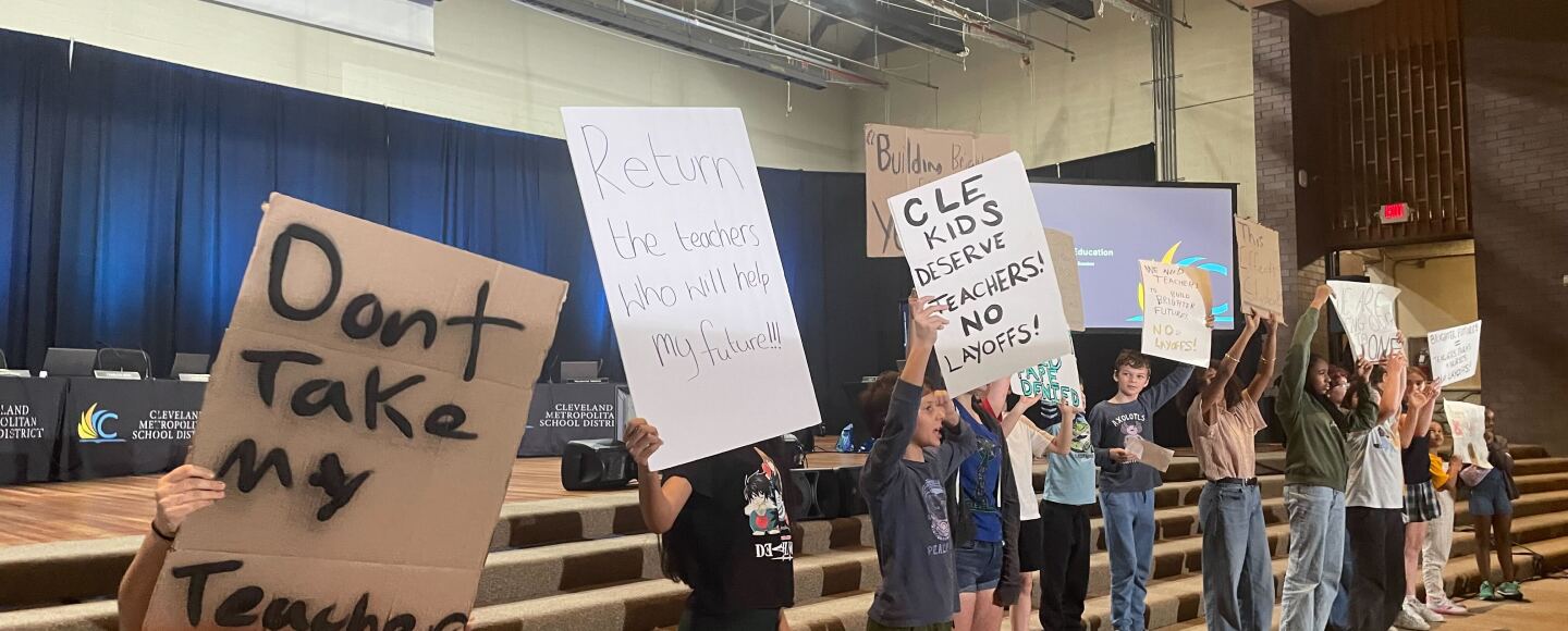 Students protest teacher layoffs inside the Cleveland Board of Education meeting at East Professional Center Tuesday in Cleveland.