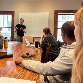 Instructor Jon Chun breaks down the basics of artificial intelligence systems for a small group of Kenyon students.