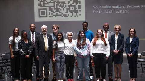 University of Illinois President Timothy Killeen and Chancellors Charles Isbell, Marie Maranda and Janet Gooch post with students and others during their 2026 Invested in Illinois tour.