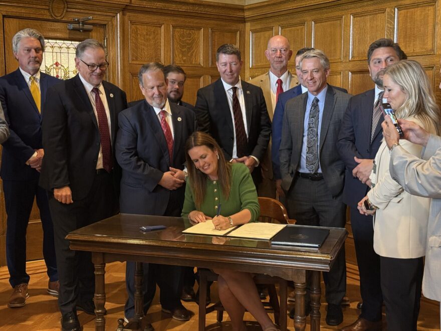 Gov. Sarah Huckabee Sanders signs the state budget for fiscal year 2027 at the Arkansas State Capitol on April 29, 2026.
