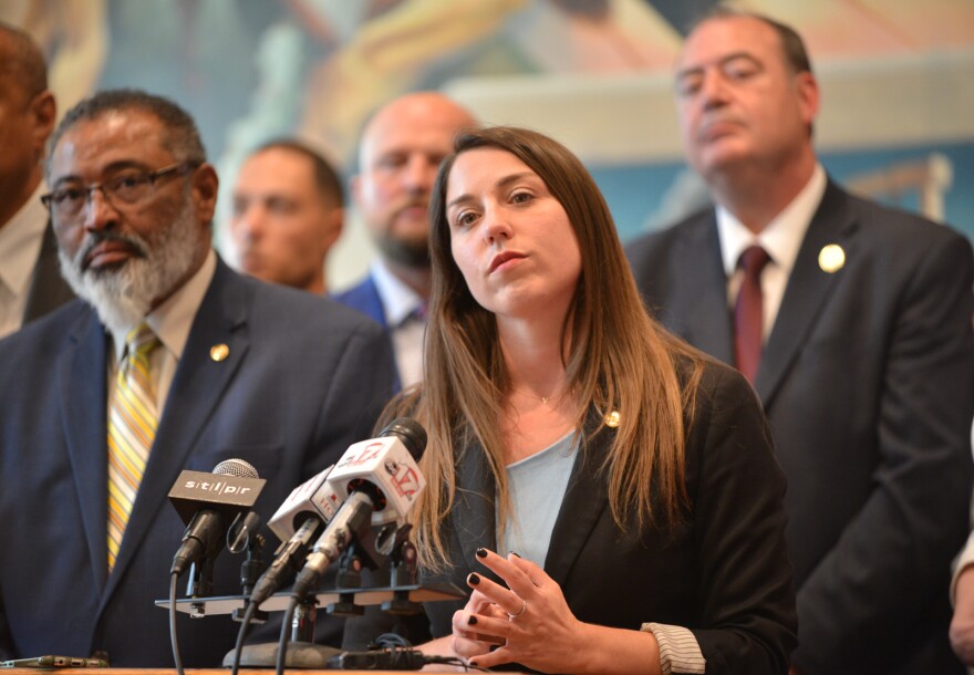 House Minority Leader Crystal Quade is backed by members of the Democratic Caucus on May 13, 2022, at the State Capitol to answer questions from the media following the end of the 2022 legislative session.