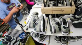 New Balance 1400s, popular lifestyle shoes, are assembled on a production line at a factory in Maine.
