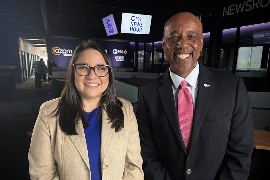 Lizbeth Canez Pompa (left) and Gene Robinson (right) in the AZPM Newsroom.