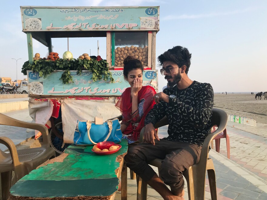 On Karachi beach where residents splash in the Arabian Sea, Arioch William, 18, and his girlfriend Sheza, 17, celebrated Valentine's Day a few days early.
