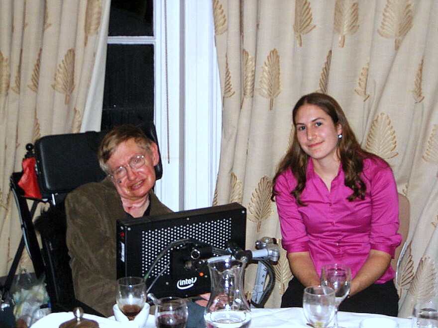 photo of Stephen Hawking and Katie Mack at the dinner table. 