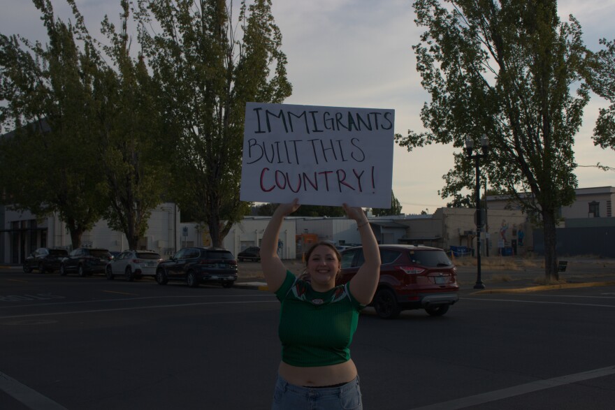 Marisol Cabrera holds a handmade sign during an anti-ICE rally in Springfield on Aug, 14, 2026.