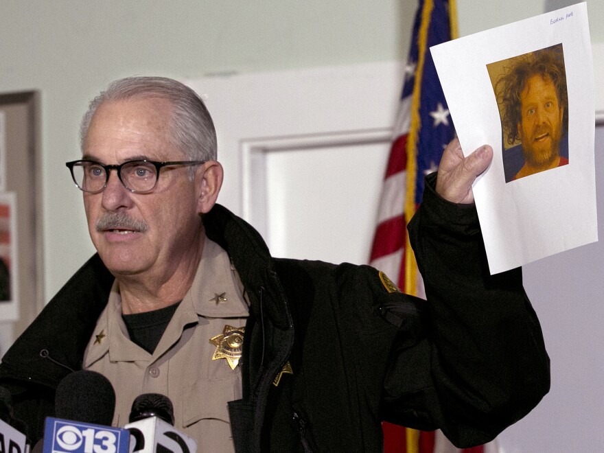 Assistant Tehama County Sheriff Phil Johnston displayed a photo of shooter Kevin Janson Neal, who was behind a series of shooting in November 2017. Russian social media agitators targeted the story.