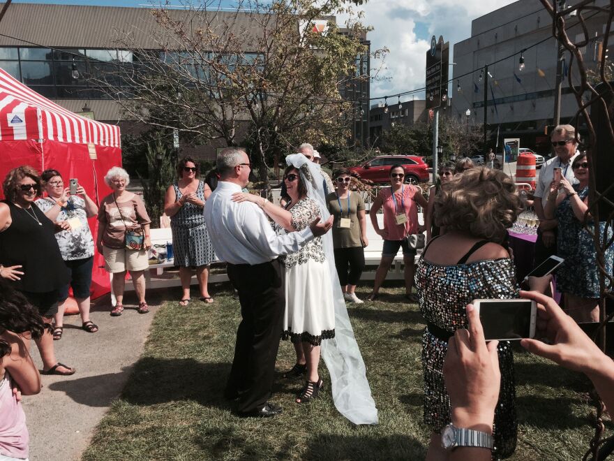 Patrick and Mary Beth Lenzi getting renewing their vows in Bushwhacked Backyard Betrothal