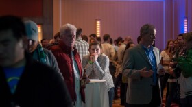 Hunter Maret of University City watches Proposition 2 election results at Union Station at a pro-soccer stadium gathering Tuesday night.