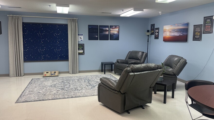 At UnityPlace, a Living Room managed by UnityPoint Health in Peoria, Illinois, there’s a large room with recliners, a Nintendo Wii, and a television. Tucked into a corner is a coffee machine and snacks.