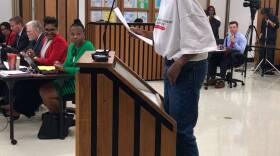 A child stands on a box as he testifies in support of the Ignite Achievement Academy during a meeting of the Indianapolis Public Schools Board on Thursday, March 16, 2017.