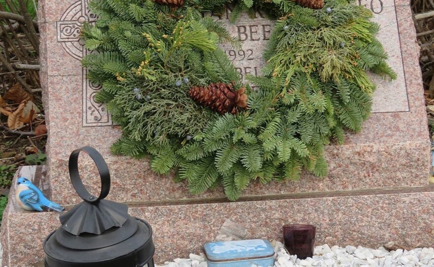 On Christmas Eve, after Mass and dinner with friends, Richard Beebe goes to the cemetery, places two lighted lanterns on the graves of his wife and daughter and spends a few quiet minutes in the presence of their memory.