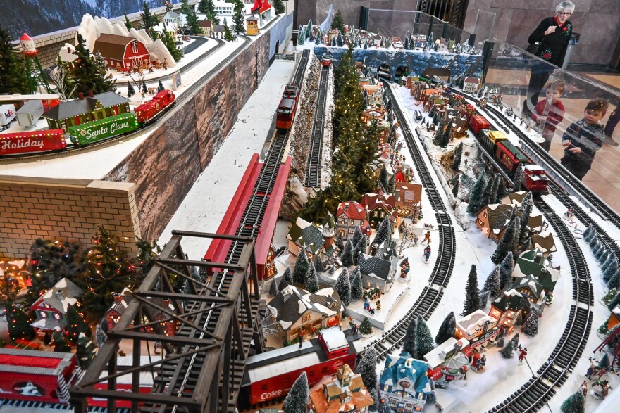 Visitors at Union Station tour through the holiday model train display inside the Grand Hall.