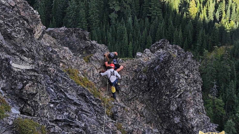 A Lane County Sheriff's Office Search and Rescue worker helps rescue a person trapped on Mt. Yoran, Aug. 27, 2026.
