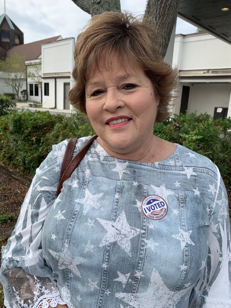 Woman wearing an I Voted sticker