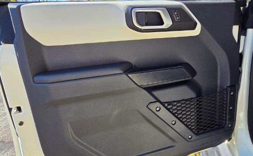 2026 Ford Bronco Outer Banks 4-door 4x4 badge door panel