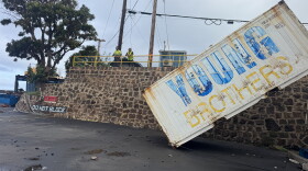Hurricane Lowell caused significant infrastructure damage to Lānaʻi's harbor and carried away shipping containers, leaving some displaced on land and others across the harbor.