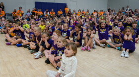 Students cheer during a ribbon-cutting ceremony for Rockwood School District's new Eureka Elementary School in August.