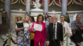 Pelosi walks in capital