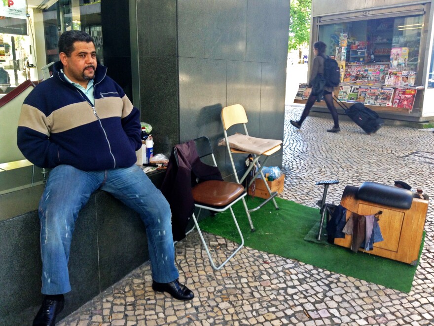 A shoe shiner named Joao says times are so tough that he can't afford to register his business or pay income tax.