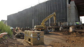 Work at the old Q-Bridge foundation, prior to construction of a retaining wall that would support traffic from I-95 Southbound to I-91 Northbound.