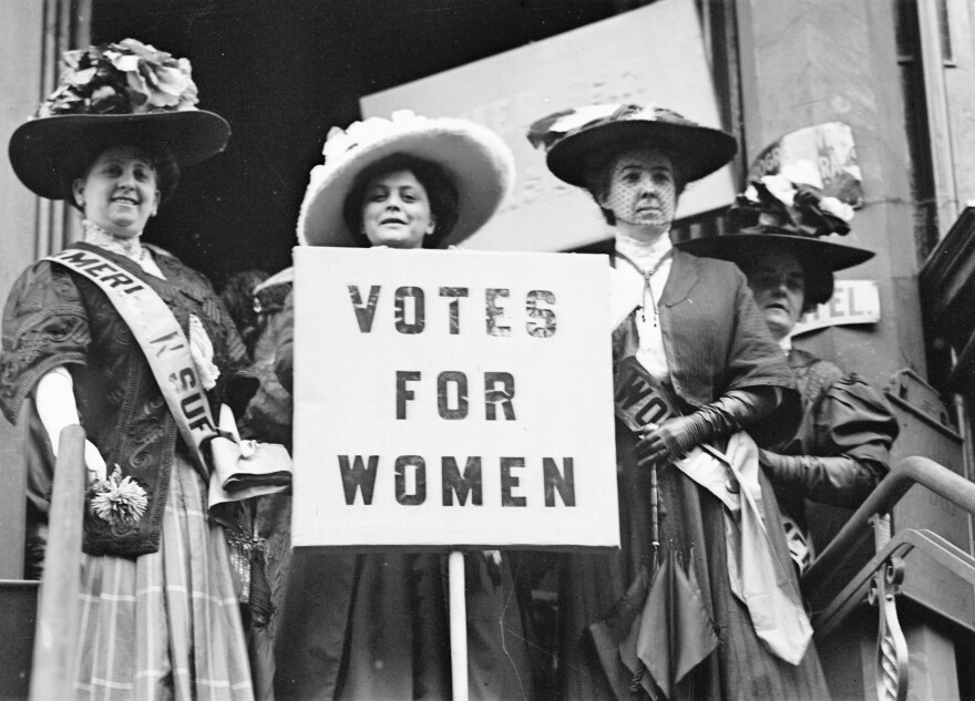 Trixie Friganza (immediately behind the sign), who inspired the song "Take Me Out to the Ballgame," was a women's suffrage advocate from Cincinnati.