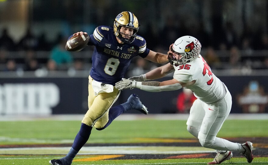 Montana State quarterback Justin Lamson runs the ball 