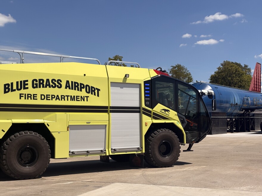 The Blue Grass Airport Fire Department truck is parked across from an aircraft fire training simulator installed last year.