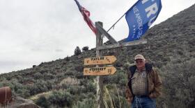 Rancher Buck Taylor proudly flies his American and Trump flags off his driveway mailboxes and signpost in Diamond Valley, Oregon. CREDIT: ANNA KING
