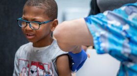 FILE: Xerius Jackson, age 7, gets an MMR vaccine at a vaccine clinic put on by Lubbock Public Health Department on March 1, 2025 in Lubbock, Texas. Cases of Measles are on the rise in West Texas as over 150 confirmed case have been seen with one confirmed death.