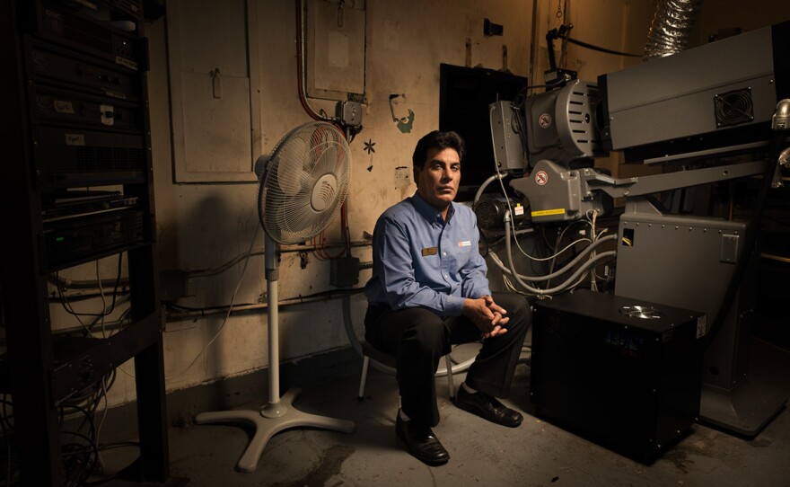 Projectionist Nadeem Malik at the Bombay Theater, Flushing, N.Y.